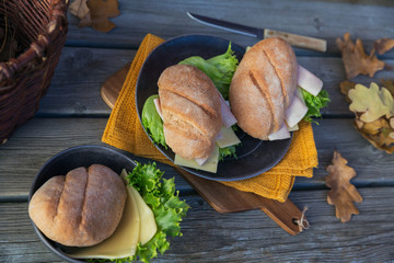 Ciabatta baguette sandwiches with ham, cheese and lettuce