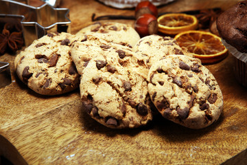 Chocolate cookies on wooden table. Chocolate chip cookies shot