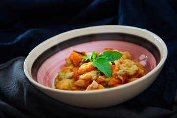 Dish made with cooked duck meat, dehydrated potato, fresh cream of mushroom and cheese