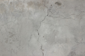 Concrete plaster cement wall with stains markings cracks detail close up