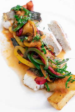 caldeirada traditional portuguese sea bream fish and vegetable spicy stew in gourmet restaurant