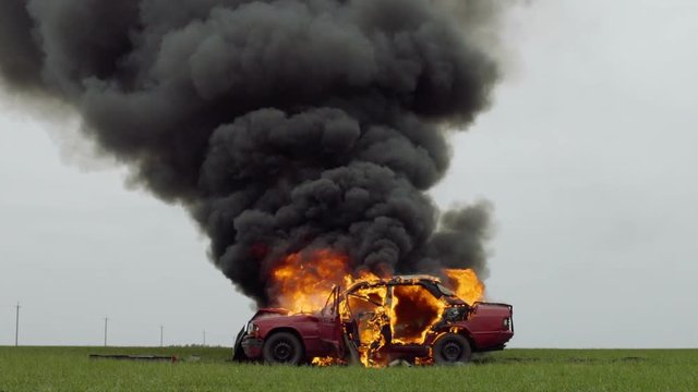 Car On Fire, Burning Car Sedan On The Field, Side View