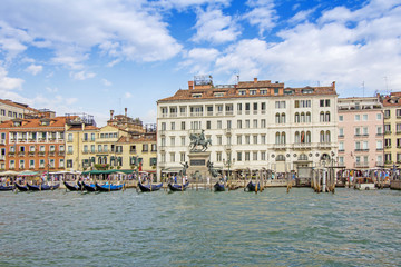 Views of beautiful buildings, gondolas, bridges and canals in Venice