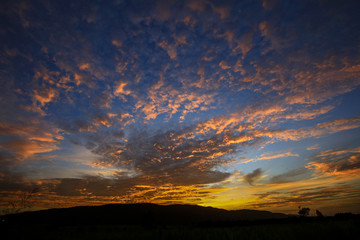 variety color an colorful cloud sky , natural background of orange blue sky in twilight time