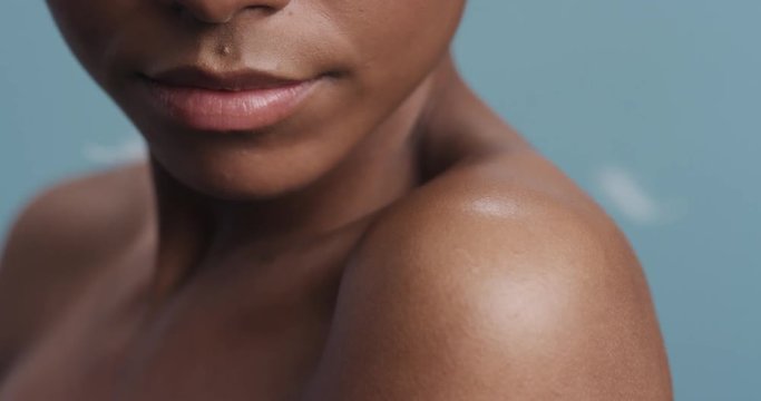 Close Up Beauty Portrait Beautiful African American Woman Feathers Falling On Smooth Skin Touching Bare Shoulders Soft Natural Skincare Gently Caressing Body Slow Motion