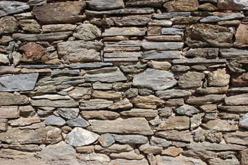 Fototapeta premium Stone wall surface texture close up detail