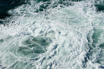 Fototapeta premium Sea water splash with foamy wave. Water surface texture