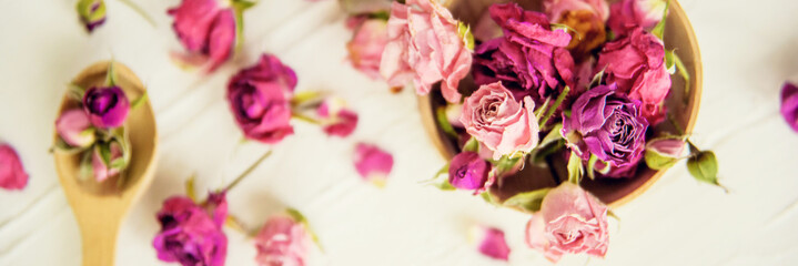 Fototapeta na wymiar Dried rose petals: for tea, alternative medicine, pot-pourri. Copy space.