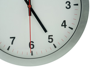 Clock on an isolated, white background close-up.