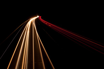 Fototapeta na wymiar Highway with traffic in a dark night