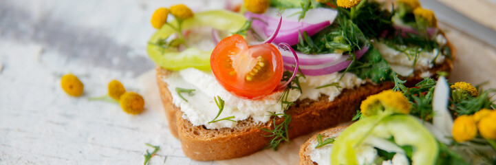 Four sandwiches on the board