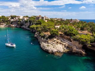 Fototapeta na wymiar Aerial view, Porto Cristo, coast with villas and natural harbor, Mallorca, Balearic Islands Spain