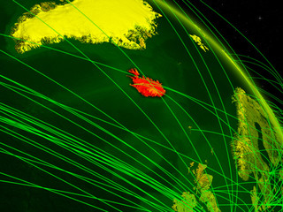 Iceland from space on model of digital planet Earth with network. Concept of digital technology, connectivity and travel.