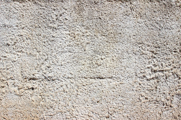 Old white grey gray plaster stucco wall outer weathered stained detail close up