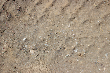 Dirt road surface texture close up tracks