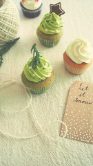 Matcha green tea cupcake and tag card decoration for christmas and happy new year background