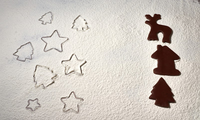 Gingerbread cookies, cookie cutters, Christmas gingerbread cookies covered with flour