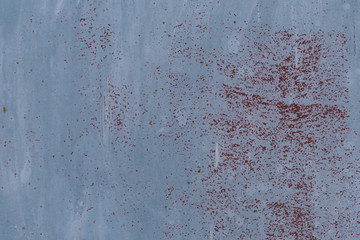 Grunge texture. Old paint on a rusty metal surface. For background and design.