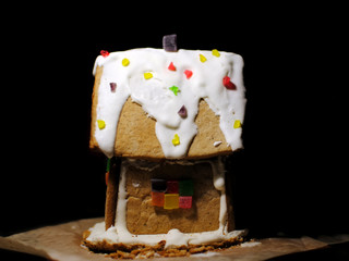 Beautiful gingerbread house on a dark background