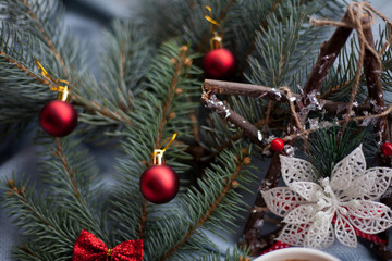 Background with xmas ornaments on spruce twig