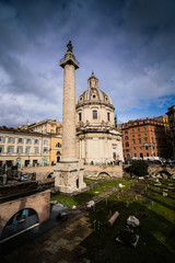 Obraz premium church in Rome on a day with a gloomy storm sky