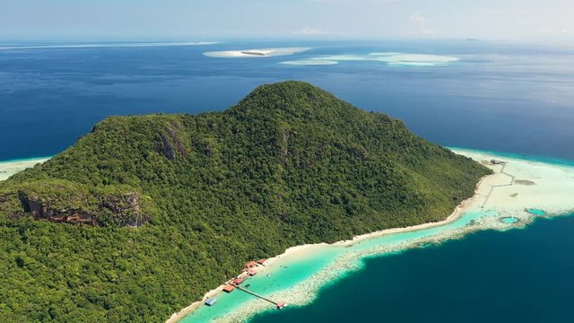 Aerial panoramic view of Pulau Bodgaya / Bohey Dulang Islands, turquoise crystal clear waters, beautiful lagoons and coral reefs of Celebes Sea - landscape panorama of Borneo, Malaysia, Pacific Ocean
