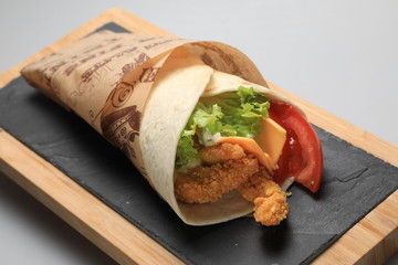 A shot of a tortilla sandwich, closeup