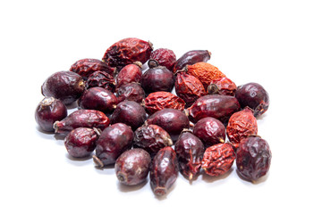 Red rosehip isolated on white background.