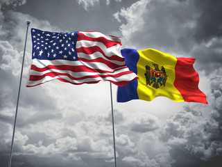 United States of America, USA & Moldova Flags are waving in the sky with dark clouds