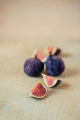 Figs on a light background with textiles and Board in rustic style.
