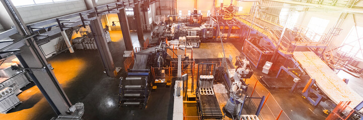 Fiberglass production industry equipment at manufacture background