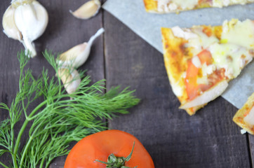 Pizza salami cheese ham. Hot Homemade Pepperoni Pizza Ready to Eat . with ingredients for cooking, greens, garlic, tomato