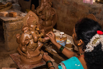 Clay model of Lord Ganesh\Ganesha being molded by local artist in the town of Bicholim, Goa
