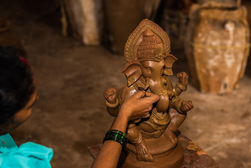Clay model of Lord Ganesh\Ganesha being molded by local artist in the town of Bicholim, Goa
