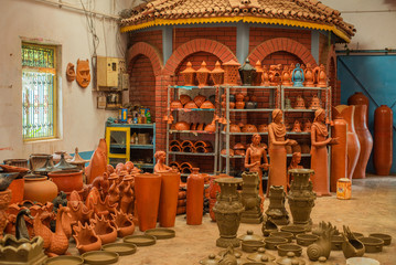 A variety of local handmade Clay pottery and home decor sold in Goa India  - obrazy, fototapety, plakaty