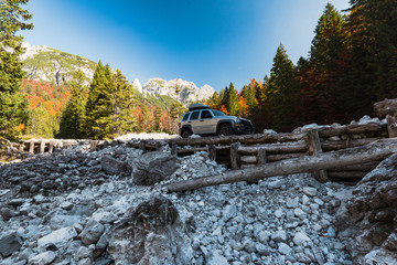 Off rad car on dangerous road in mountains