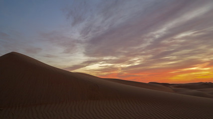 Fototapeta na wymiar Stunning Desert sunset in the Empty Quarter