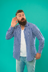 Eavesdropping and spying. Hearing test. Man bearded hipster hold hand near ear to hear better. Guy...
