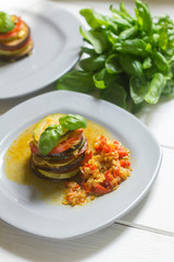 healthy vegetarian french ratatouille on white wooden background