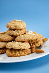 Gluten-Free Cookies almond with almond slice in white plate.
