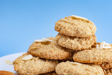 Gluten-Free Cookies almond with almond slice in white plate.