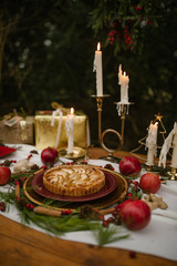 dreamy outdoor christmas dinner setting with dessert