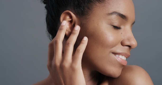 close up portrait gorgeous african american woman gently touching face with hands enjoying smooth healthy skin complexion natural feminine beauty skincare concept