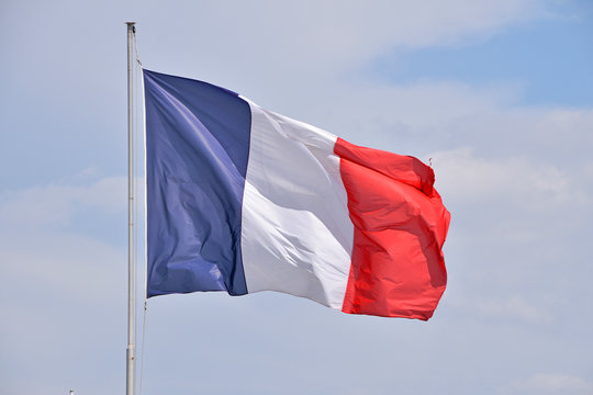Close up flag of France waving in the wind