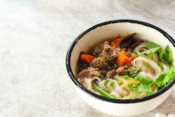 Pho Vietnamse Noodle Soup served in a bowl