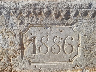 old stone inscription wall