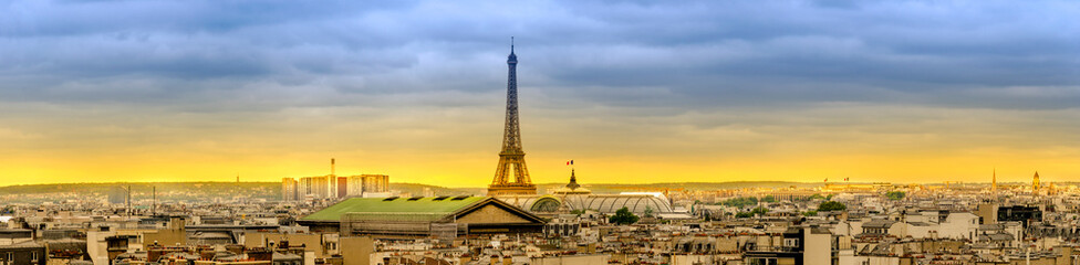 Paris skyline at sunset with view of popular landmarks, Eiffel tower, Madeleine, Grand Palais, Petit Palais, Trocaderro, Palais de Chaillot