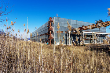 Corps of an old abandoned industrial plant. Abandoned construction of a nuclear power plant in Odessa, Teplodar. Industrial unnecessary object since the USSR