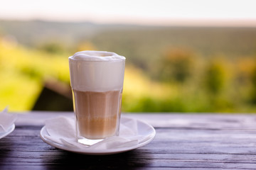 A glass of cappuccino on the terrace. Lithuania, Vilnius district