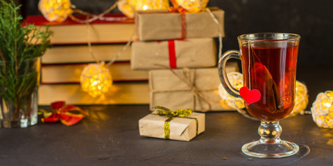 Tea and festive atmosphere (heart and love) Hot Beverages on the table. Copy space.